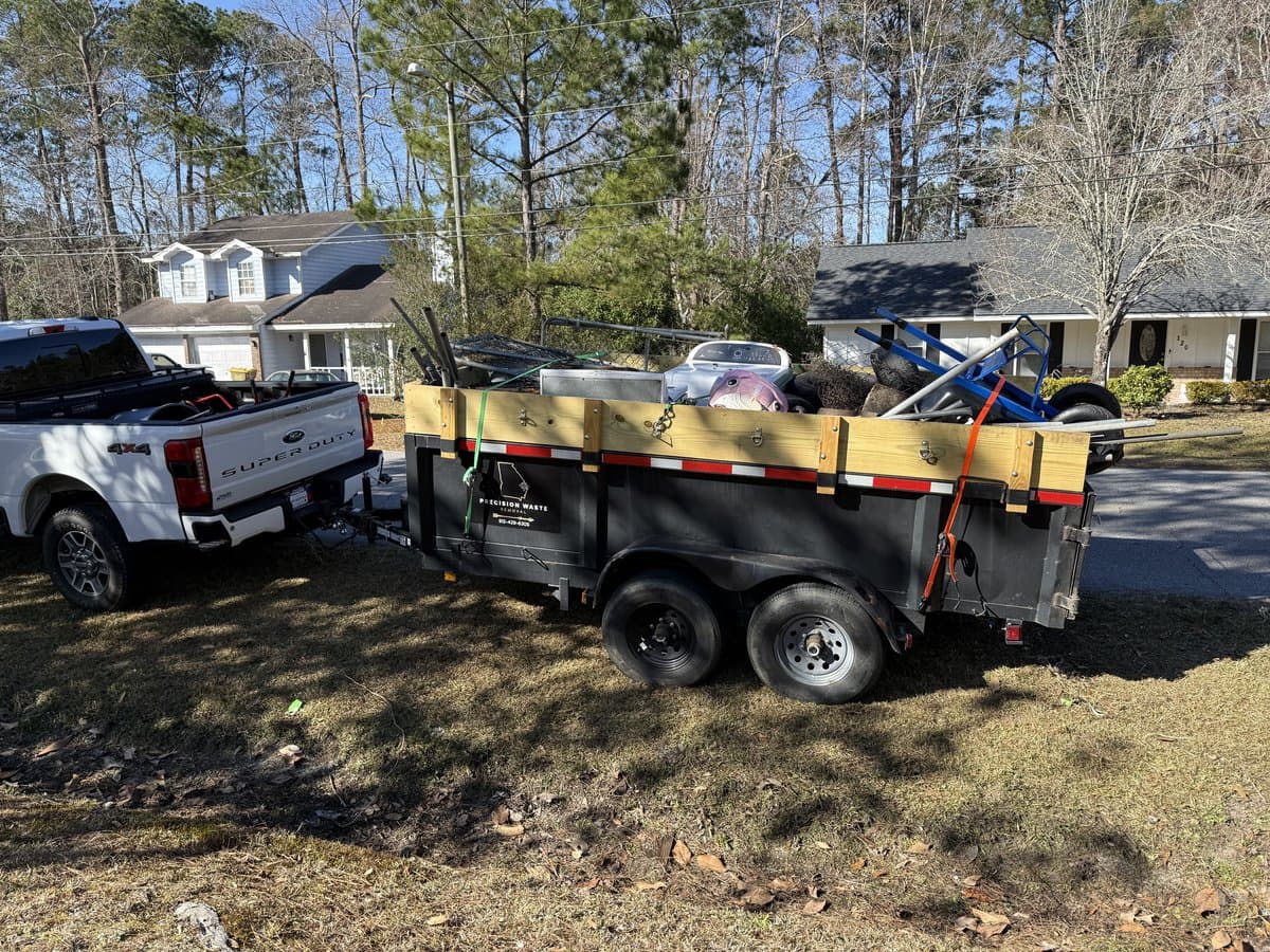 Truck and trailer loaded with debris in Springfield GA